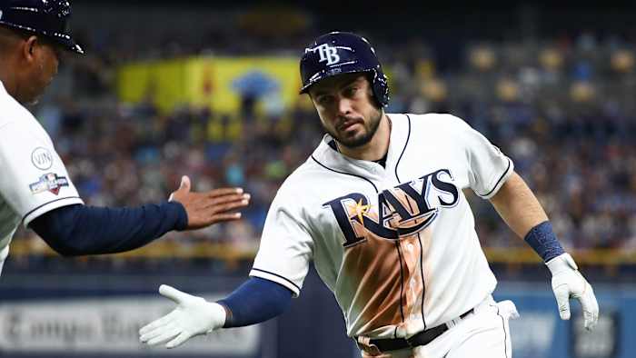 Catcher Travis d'Arnaud signed with the Atlanta Braves on a two-year, $16 million deal.